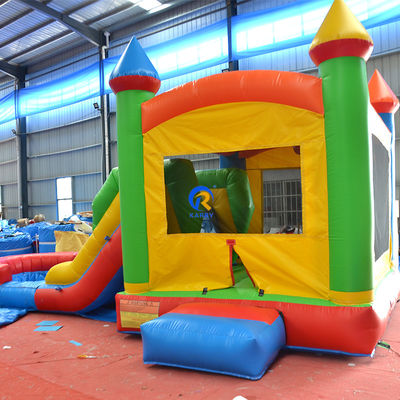Casa de salto inflável de Pvc de cor comercial com slide combo