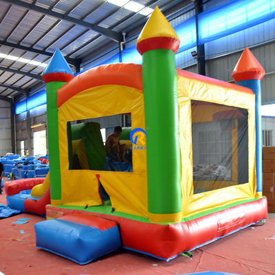 Casa de salto inflável de Pvc de cor comercial com slide combo