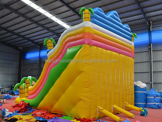 Jogos de parque ao ar livre 2 pistas Palmeira tropical PVC inflável Dinossauro Salto Salto Slide