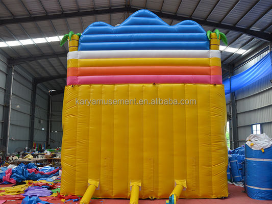 Jogos de parque ao ar livre 2 pistas Palmeira tropical PVC inflável Dinossauro Salto Salto Slide