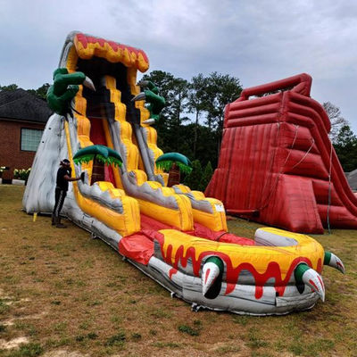 Grandes escorregas infláveis para adultos 36ft emocionante jogo de salto com tema de dinossauro tropical