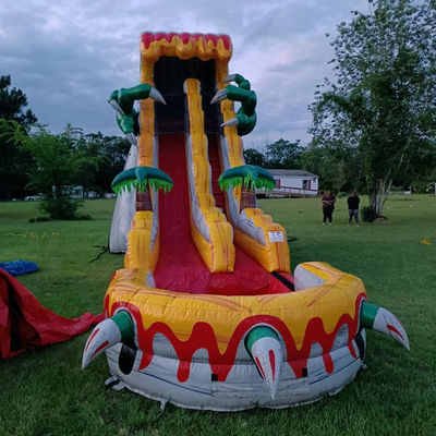 Grandes escorregas infláveis para adultos 36ft emocionante jogo de salto com tema de dinossauro tropical