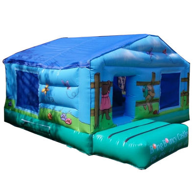 Trampolim de piquenique comercial para crianças com castelo de salto inflável azul e buraco de bola