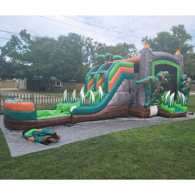 Dinossauros do Jurássico Casa de salto inflável de PVC comercial com escorrega com sopro