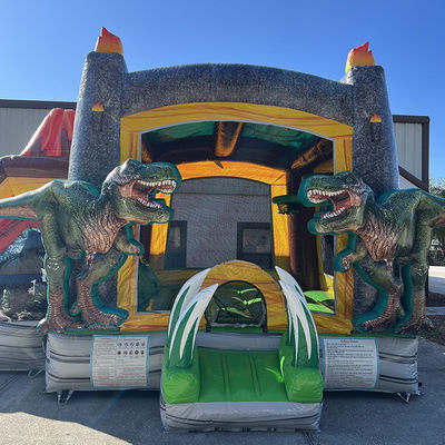 Dinossauros do Jurássico Casa de salto inflável de PVC comercial com escorrega com sopro