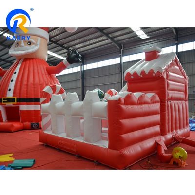 Um segurança inflável de Natal com escorrega revoluciona o negócio de aluguer de festas