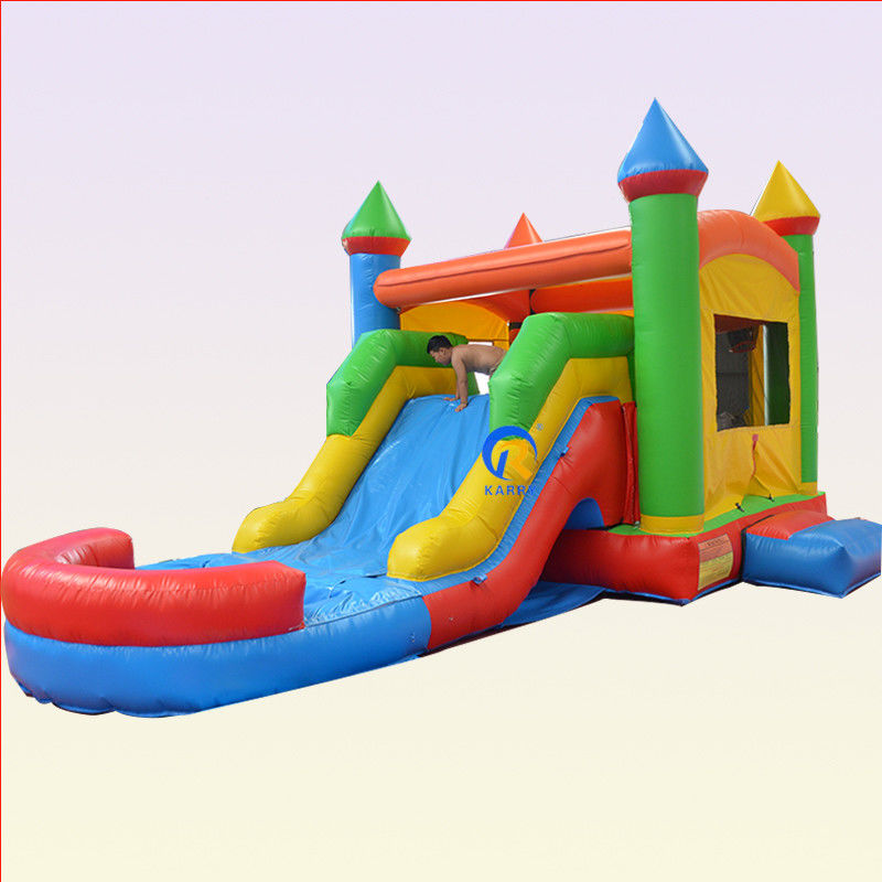 Casa de salto inflável de Pvc de cor comercial com slide combo